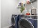 Laundry room with washer, dryer, and shelving at 9179 Fort Hill Way, Myrtle Beach, SC 29579