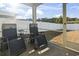 Relaxing screened porch with outdoor seating and backyard views at 9179 Fort Hill Way, Myrtle Beach, SC 29579