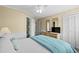 Bedroom with a queen bed, dresser, and ensuite bathroom access at 9560 Shore Dr. # 3A, Myrtle Beach, SC 29572