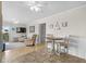 Small dining area with table and chairs, adjacent to living room at 9560 Shore Dr. # 3A, Myrtle Beach, SC 29572