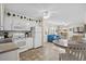 Bright kitchen features white cabinets, stainless steel appliances, and tile flooring at 9560 Shore Dr. # 3A, Myrtle Beach, SC 29572