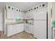 White kitchen with stainless steel appliances and ample counter space at 9560 Shore Dr. # 3A, Myrtle Beach, SC 29572