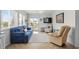 Comfortable living room featuring a sofa, recliner, and flat-screen TV at 9560 Shore Dr. # 3A, Myrtle Beach, SC 29572