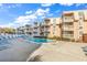 Resort-style pool with surrounding lounge chairs and landscaping at 9560 Shore Dr. # 3A, Myrtle Beach, SC 29572