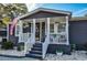 Inviting front porch with rocking chairs and decor at 1005 S Marlin Circle, Murrells Inlet, SC 29576