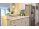 Modern kitchen with white cabinets and quartz countertops at 1005 S Marlin Circle, Murrells Inlet, SC 29576