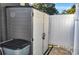 Gray and white storage shed with adjacent gate at 1005 S Marlin Circle, Murrells Inlet, SC 29576