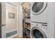 Convenient laundry closet with stackable washer and dryer at 1023 Marthas Way, North Myrtle Beach, SC 29582