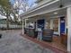 Outdoor patio area with comfortable seating and string lights at 1023 Marthas Way, North Myrtle Beach, SC 29582