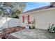 Side yard with patio, storage, and hose at 104 Osprey Cove Loop, Myrtle Beach, SC 29588