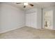 Well-lit bedroom with double-door closet and en-suite bathroom access at 104 Osprey Cove Loop, Myrtle Beach, SC 29588