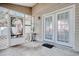 Screened porch with double doors leading to the backyard at 104 Osprey Cove Loop, Myrtle Beach, SC 29588