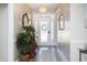 Bright entryway with decorative mirror and plant at 1055 University Forest Dr., Conway, SC 29526