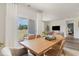 Bright dining area with sliding glass doors leading to backyard at 1107 Black Lake Way, Conway, SC 29526