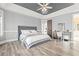 Main bedroom with gray walls, plush carpeting, and ample natural light at 117 Ashley River Rd., Myrtle Beach, SC 29588