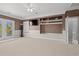 Main bedroom with large windows, a built-in entertainment center, and patio access at 117 Ashley River Rd., Myrtle Beach, SC 29588