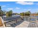 Peaceful waterfront dock with a wooden bench at 117 Ashley River Rd., Myrtle Beach, SC 29588