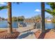 Peaceful waterfront dock with seating area at 117 Ashley River Rd., Myrtle Beach, SC 29588