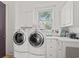 Convenient laundry room with washer, dryer, and ample storage at 117 Ashley River Rd., Myrtle Beach, SC 29588