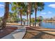 Landscaped backyard with a private dock on the water at 117 Ashley River Rd., Myrtle Beach, SC 29588