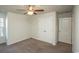 Bright bedroom with ceiling fan, double door closet, and carpet flooring at 1574 Jardine Loop, Little River, SC 29566