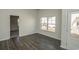 Bright dining room with view into the kitchen and backyard at 1574 Jardine Loop, Little River, SC 29566