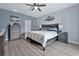 Main bedroom with ceiling fan and nautical-themed decor at 1584 Swing Bridge Way, Myrtle Beach, SC 29588