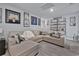 Bright Gathering room featuring a sectional sofa and built-in shelving at 1584 Swing Bridge Way, Myrtle Beach, SC 29588