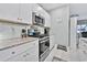 Kitchen with granite countertops and stainless steel appliances at 1584 Swing Bridge Way, Myrtle Beach, SC 29588