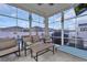 Relaxing sunroom overlooking the backyard and pool area at 1584 Swing Bridge Way, Myrtle Beach, SC 29588