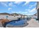 Relaxing backyard oasis featuring a pristine swimming pool with a water feature at 1584 Swing Bridge Way, Myrtle Beach, SC 29588