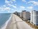 Aerial view of oceanfront building and beach at 161 Seawatch Dr. # 610, Myrtle Beach, SC 29572