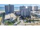 Aerial view of oceanfront resort, multiple buildings, parking and landscaping at 161 Seawatch Dr. # 610, Myrtle Beach, SC 29572