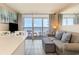 Living room with ocean view and balcony access at 161 Seawatch Dr. # 610, Myrtle Beach, SC 29572