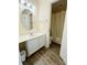 Bright bathroom with white vanity and tub at 1650 Deercreek Rd., Surfside Beach, SC 29575