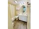 Clean bathroom with white vanity, tub, and shower at 1650 Deercreek Rd., Surfside Beach, SC 29575