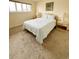 Bedroom with striped bedding and nightstands at 1650 Deercreek Rd., Surfside Beach, SC 29575