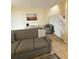 Living room with gray couch and view of staircase at 1650 Deercreek Rd., Surfside Beach, SC 29575