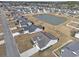 Aerial view of a house with a gray roof in a neighborhood at 169 Riverwatch Dr., Conway, SC 29527