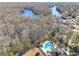 Aerial view showing home, pool, and surrounding waterfront community at 169 Riverwatch Dr., Conway, SC 29527