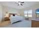 Main bedroom with king bed, large window, and ample floor space at 169 Riverwatch Dr., Conway, SC 29527