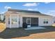 House exterior with screened porch and landscaping at 169 Riverwatch Dr., Conway, SC 29527