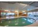 Relaxing indoor pool with seating area and large windows at 1706 S Ocean Blvd. # 1101, North Myrtle Beach, SC 29582