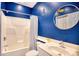 Clean bathroom with shower/tub combo and white vanity at 19 Cattail Ct. # 2B, Pawleys Island, SC 29585