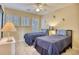 Bedroom with two twin beds and light beige walls at 19 Cattail Ct. # 2B, Pawleys Island, SC 29585