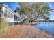 House exterior with water view and landscaping at 19 Cattail Ct. # 2B, Pawleys Island, SC 29585