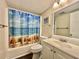 Clean bathroom with a shower/tub combo and beach-themed decor at 1906 S Ocean Blvd. # 108A, Myrtle Beach, SC 29577