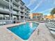 Large rectangular pool with plenty of lounge chairs at 1906 S Ocean Blvd. # 108A, Myrtle Beach, SC 29577