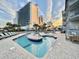 Resort-style pool area with multiple pools and lounge chairs at 1906 S Ocean Blvd. # 108A, Myrtle Beach, SC 29577