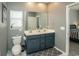 Double vanity bathroom with gray walls at 2024 Willow Run Dr., Little River, SC 29566